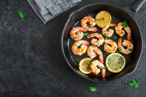 istock Roasted shrimps with lemon, garlic 916832986