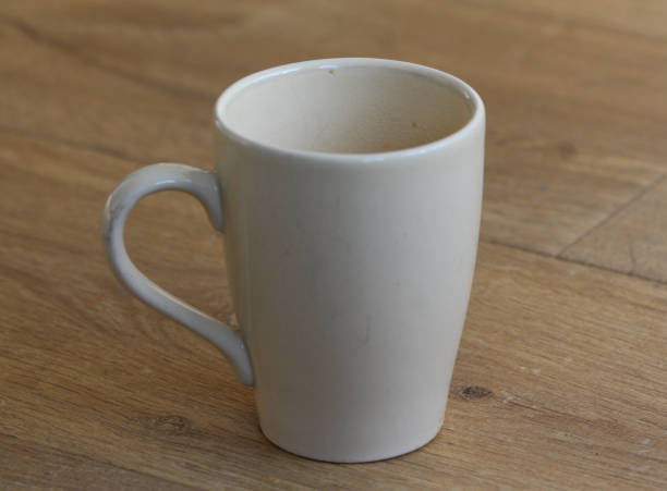 istock Cup of black coffee on wooden background 916836142