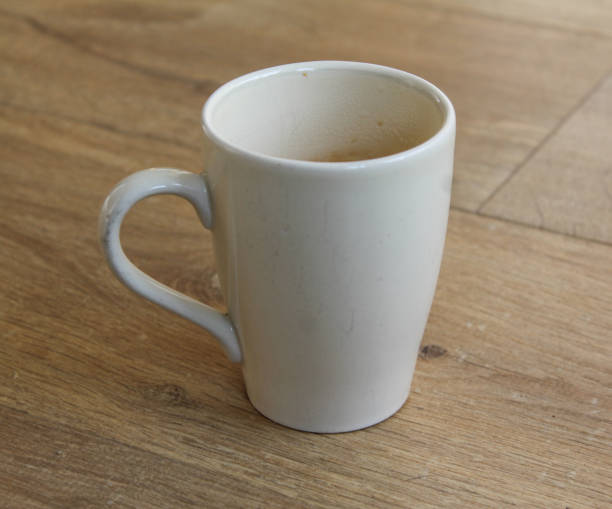 istock Cup of black coffee on wooden background 916836168