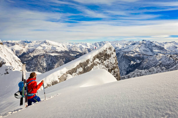 istock Freerider with Backpack at Mount Watmann, Nationalpark Berchtesgaden in Alps 916837364