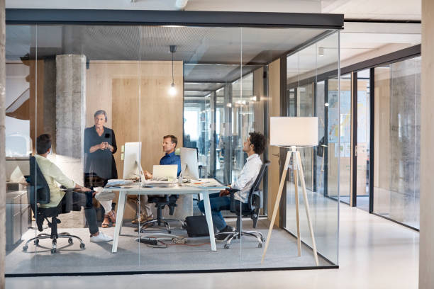 istock Business people discussing in board room 916844518