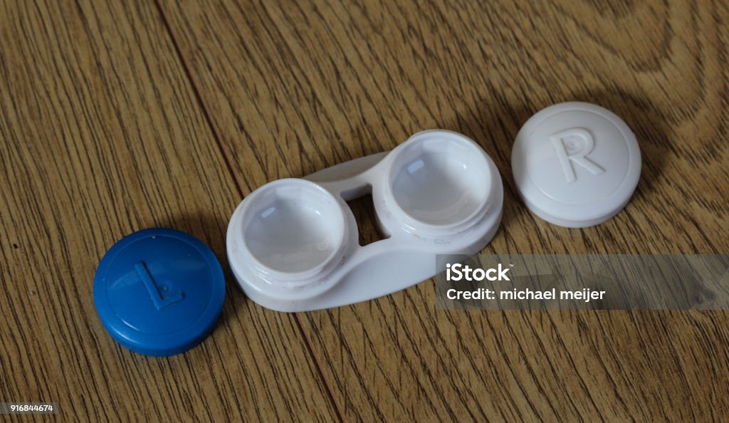 Simpel Eye Contact Lens Case Travel Box Holder On Wooden Background Stock  Photo - Download Image Now - iStock