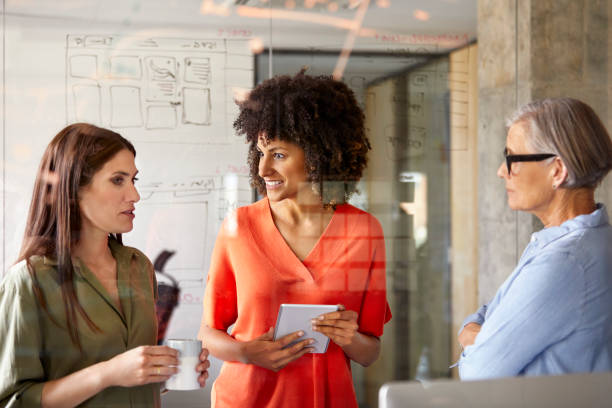 istock Multi-ethnic businesswomen planning in office 916844802