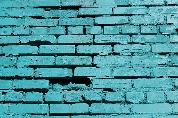 bright blue parede de tijolos - flecking - fotografias e filmes do acervo