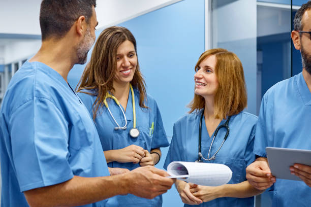 istock Veterinarians discussing over medical records 916855638