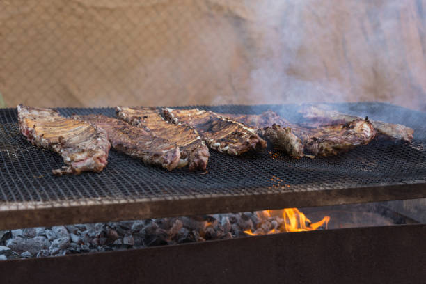 istock Outdoor Grilled Meat: Steaks and Sausages 916858778