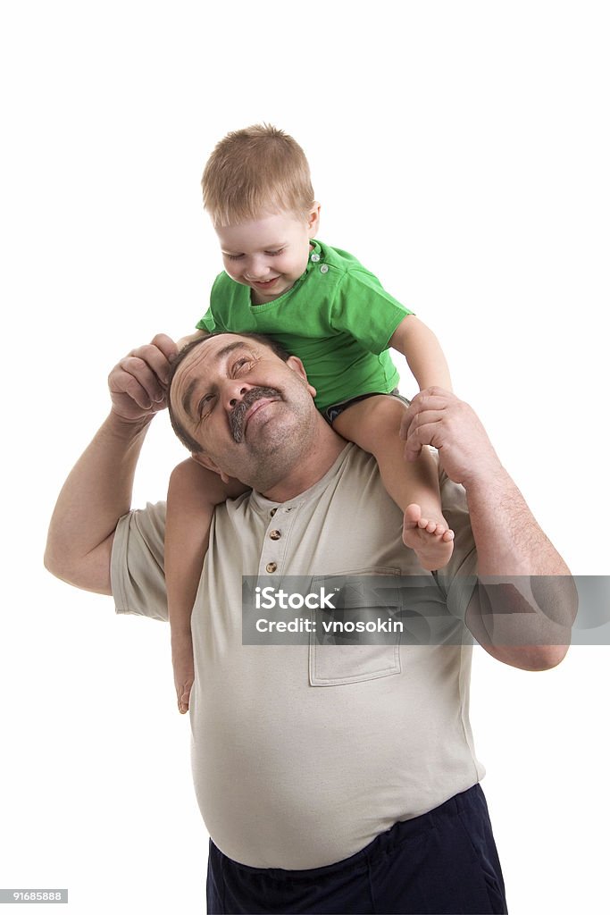 Petit-fils et grand-père - Photo de Fond blanc libre de droits