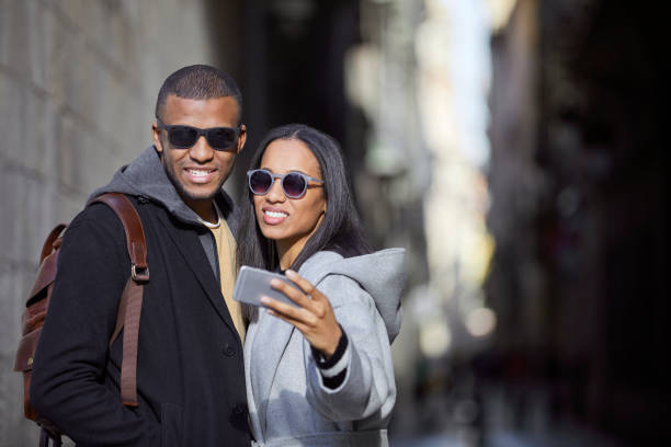 istock Smiling couple taking selfie on sunny day 916862108