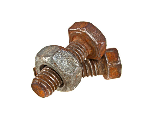 istock Two old rusty bolts and screw-nut isolated on white background 916862906