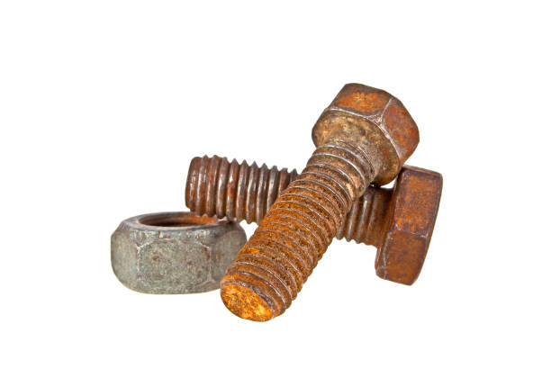 istock Two old rusty bolts and screw-nut isolated on white background 916862912