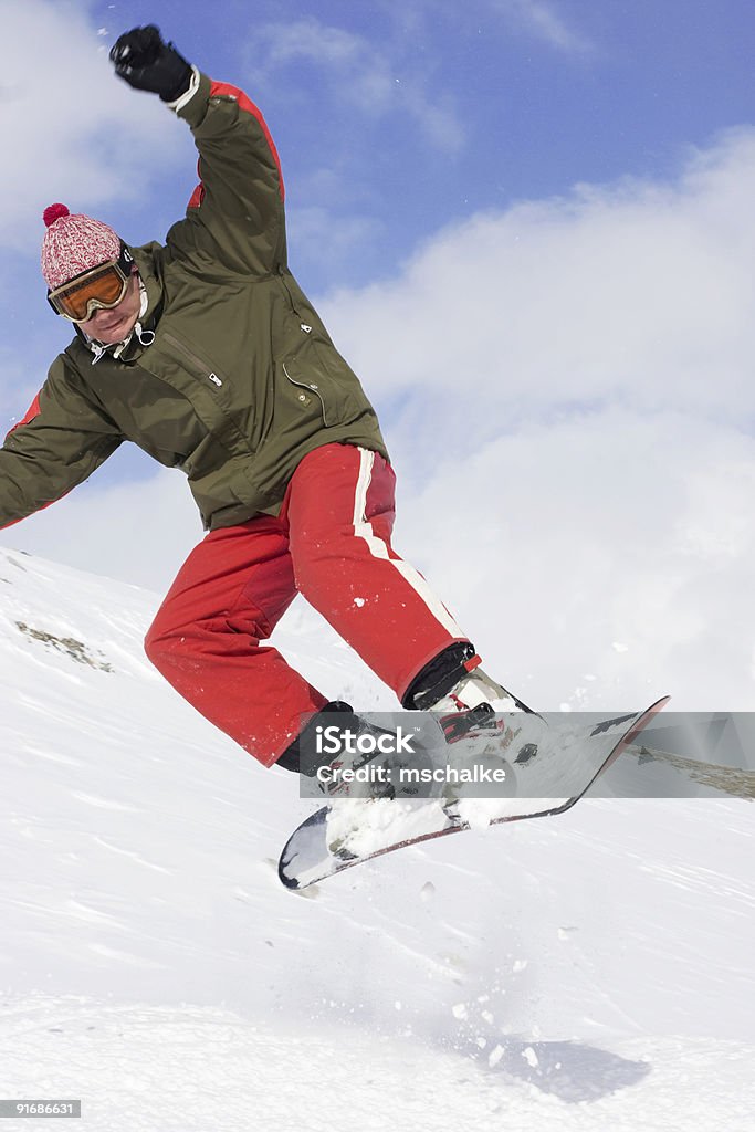 Faire du snowboard - Photo de Adolescent libre de droits