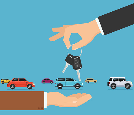 Person gives apartment keys to another person. Concept transfer automobile keys.