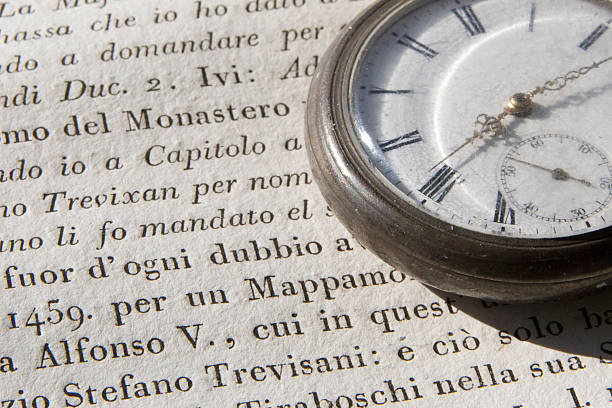 istock Old clock on antique italian book 91686833