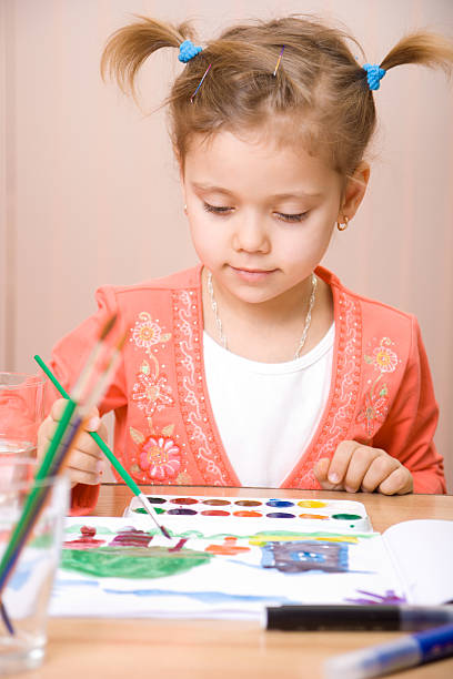 istock Pretty caucasian child watercolor paint 91687287