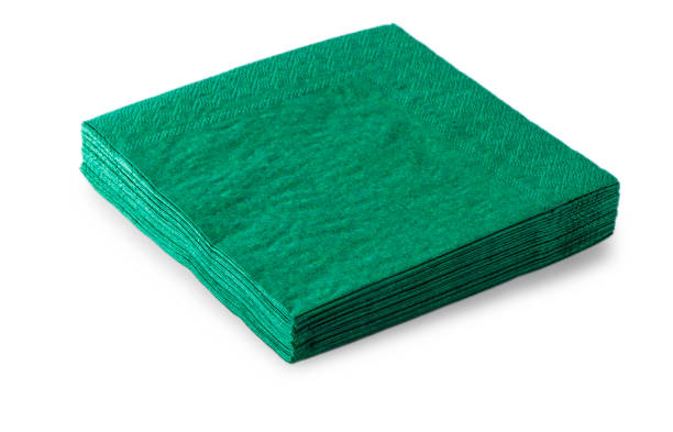 istock green napkins isolated on white background. 916875950