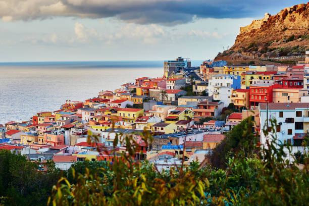 Castelsardo village in Sardinia, Italy Scenic view to Castelsardo village with its colorful houses and marina in Sardinia, Italy castelsardo stock pictures, royalty-free photos & images