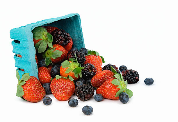 istock Pint Turned Sideways and Spilling Out Mixed Berries Isolated 91688358