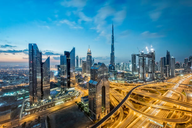 City lights in Dubai; United Arab Emirates Dubai, Burj Khalifa, United Arab Emirates, Sunset, Cityscape dubai street stock pictures, royalty-free photos & images
