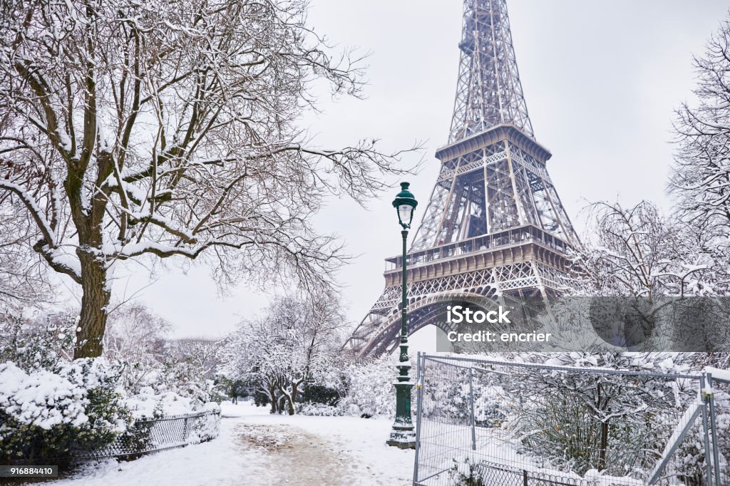 Scenic view of Eiffel tower on snowy day Scenic view to the Eiffel tower on a day with heavy snow. Unusual weather conditions in Paris Paris - France Stock Photo