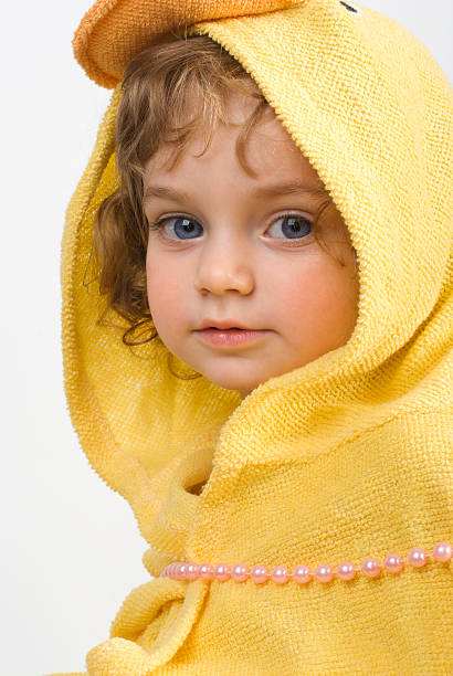 istock girl after bath in yellow towel 91688497