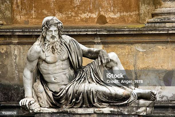 Sculpture Of Semilaying Man Stock Photo - Download Image Now - Archaeology, Architecture, Art