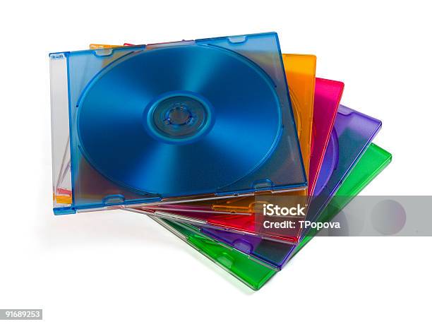 Computer Disks In Multiciolored Boxes Stock Photo - Download Image Now - Advice, Blue, Box - Container