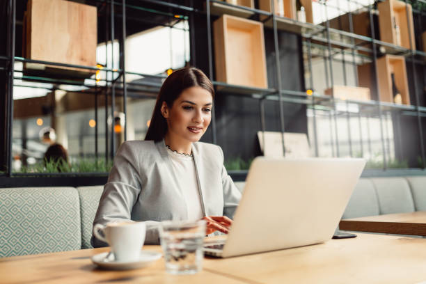 istock Young businesswoman using laptop. 916895364