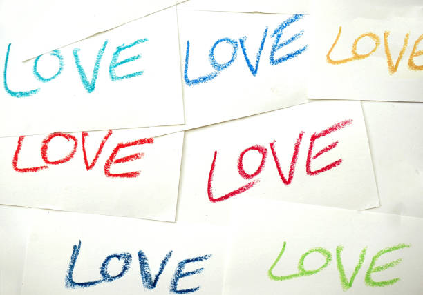 istock drawing heart and word love on paper background 916896414