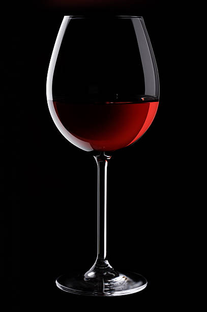 istock A glass of red wine on a black background 91689904