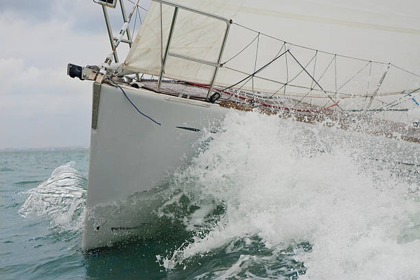 istock Sailing Boat or Yacht Breaking The Waves 91690640