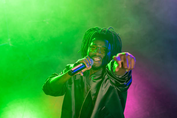 istock DJ with microphone in nightclub 916906416