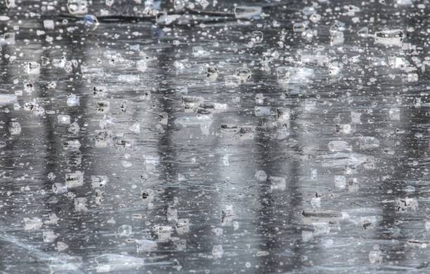istock Ice surface on a frozen lake 916906740