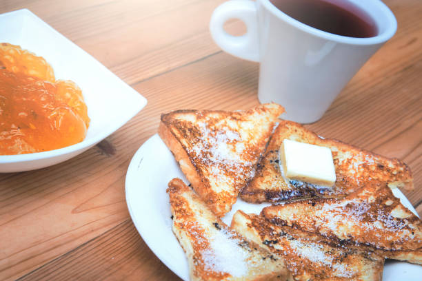 istock Tea and test on a wooden table 916906858