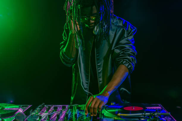 istock professional DJ in with sound mixer 916907250