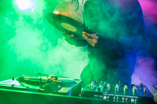 istock DJ with vinyl on concert 916907638