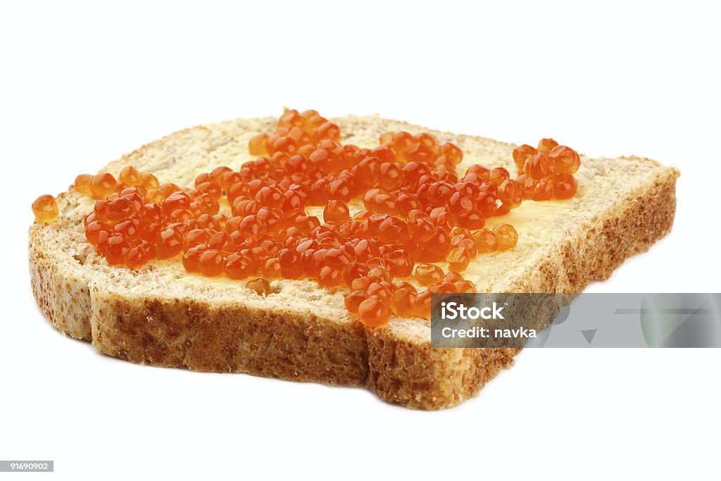 Roter Kaviar auf Braun Scheiben Vollkornbrot mit butter - Lizenzfrei Brotscheibe Stock-Foto