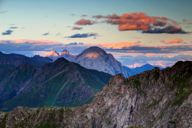 istock Sharp peaks at sunset in Carnic Alps main ridge and Julian Alps 916910606
