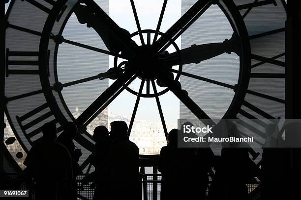 People Walking Near A Big Clock Stock Photo - Download Image Now - Aspirations, Back Lit, Beat The Clock