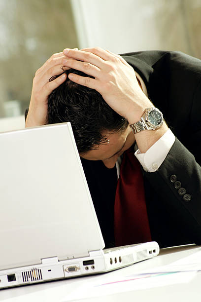 frustrated businessman stock photo