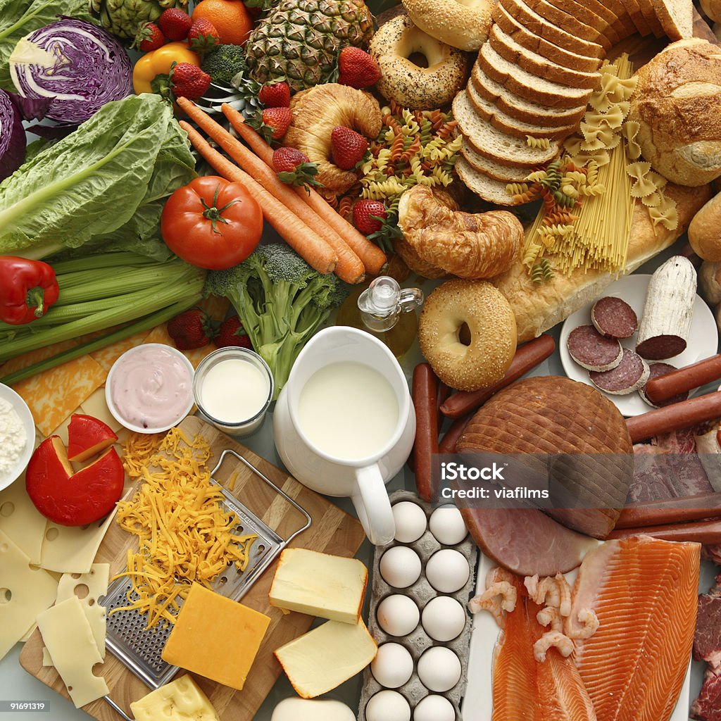 Large group of foods Overhead view of a large group of raw foods Bread Stock Photo