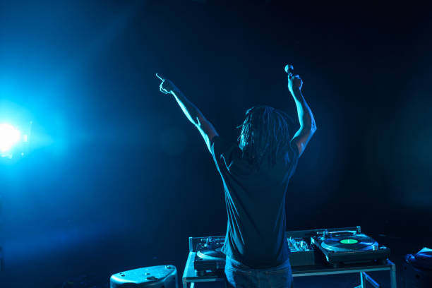 istock DJ with sound mixer on concert 916913614
