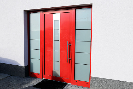 Modern red front door with frosted glass