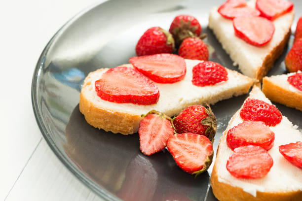 istock sandwiches with strawberries 916917796