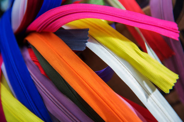 istock Bunch of multicolored zippers 916918974