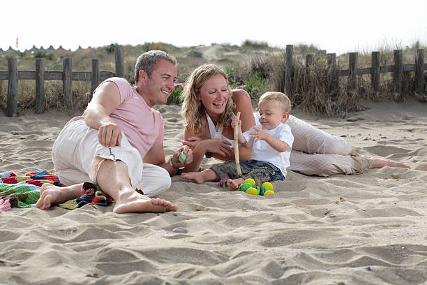 istock young beautiful family on the beach 91691918