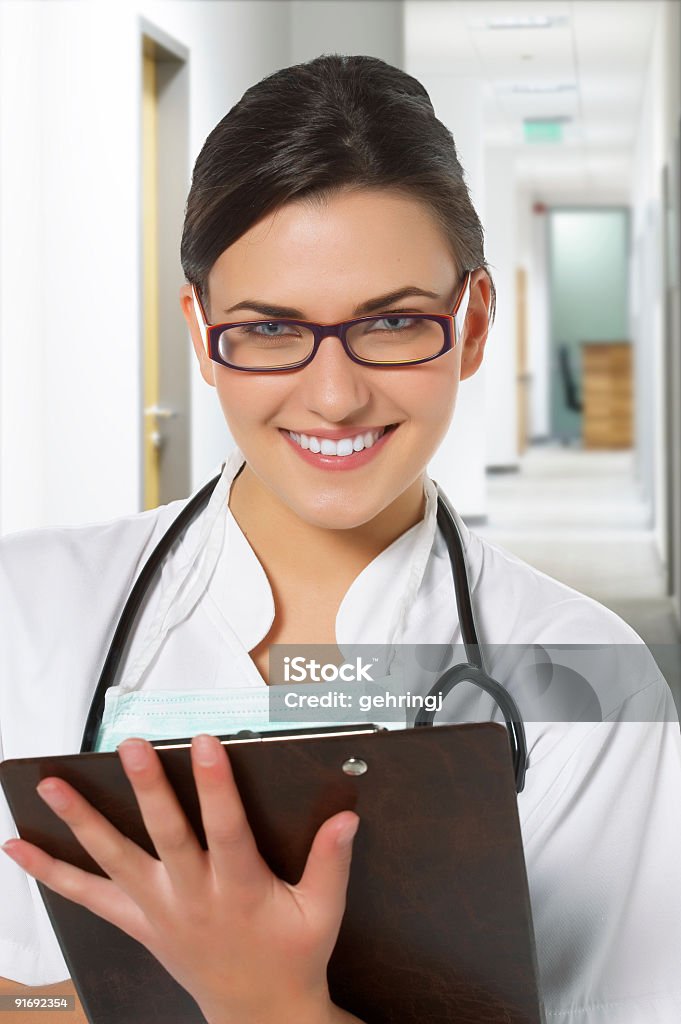 Hermosa mujer médico - Foto de stock de Abrigo libre de derechos