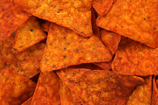 Hot corn chips background stock photo