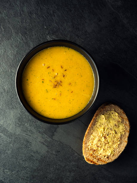 butternuts squash and red lentils soup stock photo