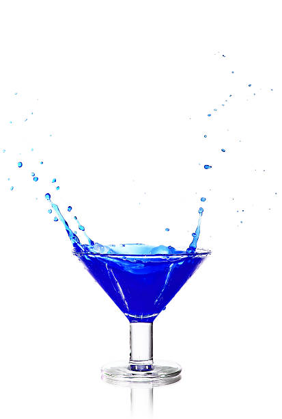 istock Ice splash into glass of blue water 91693165
