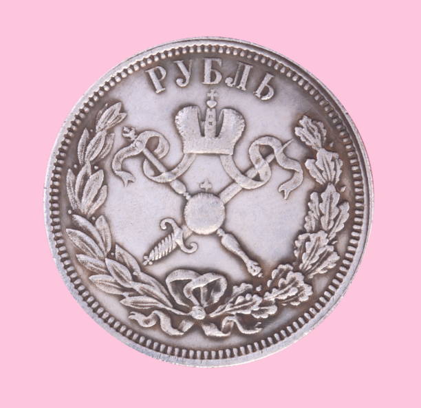 istock ruble coin isolated on pink background 916931746